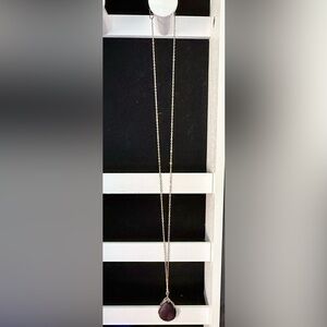 Elegant Gold Necklace with Black Pendant